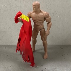 SU-MF-C-SUPBD: Wired battle damaged red cape with logo for McFarlane Superman