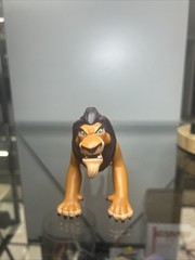 collectible action figure of Scar ( Lion king )