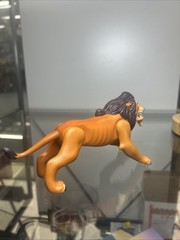 collectible action figure of Scar ( Lion king )