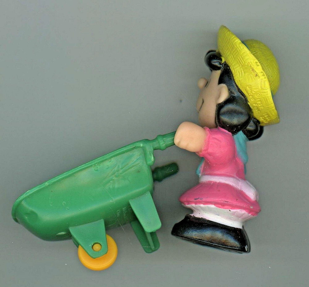 Lucy 3″ Tall Hard Rubber? ABS Plastic? Figurine pushing a wheelbarrow B2-B7