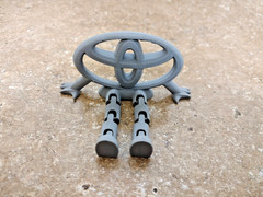 3D Printed Toyota Logo Articulated Desk Toy Figure Gray PLA Decor