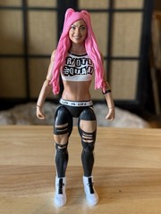 One recently opened loose WWE Liv Morgan action figure from 2020 by Mattel.