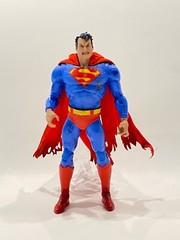 SU-MF-C-SUPBD: Wired battle damaged red cape with logo for McFarlane Superman