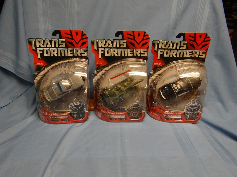 TRANSFORMERS GENERATION ONE BARRICADE, RECON BARRICADE AND BRAWL DECEPTICON SET