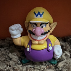 Nintendo Super Mario Bros Wario Figure Yellow Purple TV Movie Video Games Theme