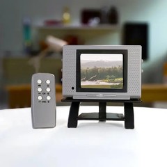 Tiny TV Classics Collectible TV with Real Working Remote (Jurassic Park)