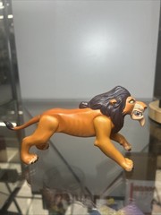 collectible action figure of Scar ( Lion king )